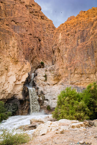 istock Powerful waterfall in Judean Desert 1477099879