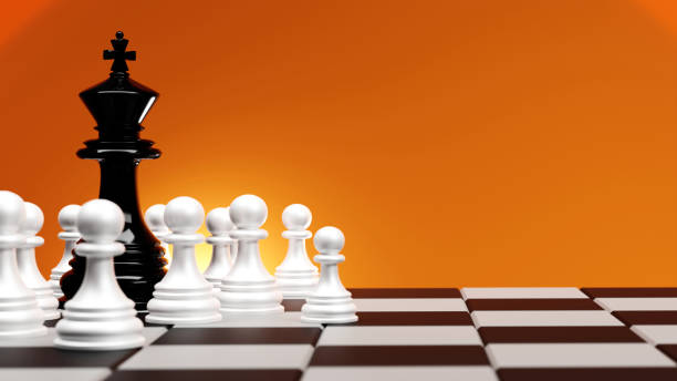 istock A single standing black chess king piece among many white pawns, 3D rendering 1477102497