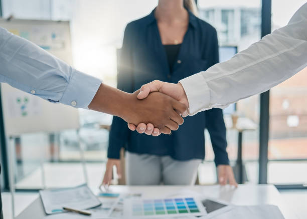 istock Handshake, office and business people with corporate deal, agreement or partnership with success. Meeting, professional and businessmen shaking hands for welcome, greeting or company onboarding. 1477103607