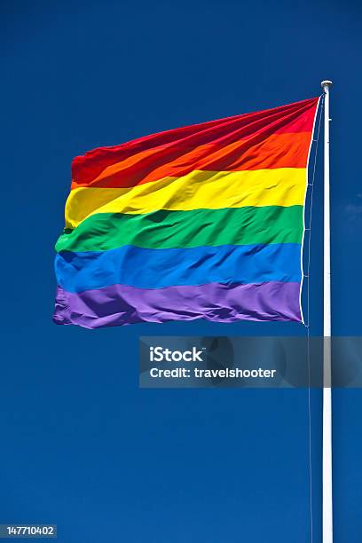 Gay Pride Flag Fluttering In Wind Stock Photo - Download Image Now - Blue, Rainbow Flag, Sky