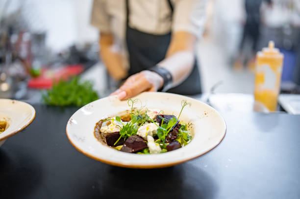 istock professional chef's hands cooking beetroot salad with feta cheese in a restaurant kitchen 1477105634