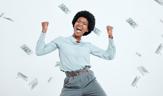Money win, success and black woman excited about finance freedom, investment and salary on a white studio background. Accounting, happy and portrait of a business employee in celebration of cash