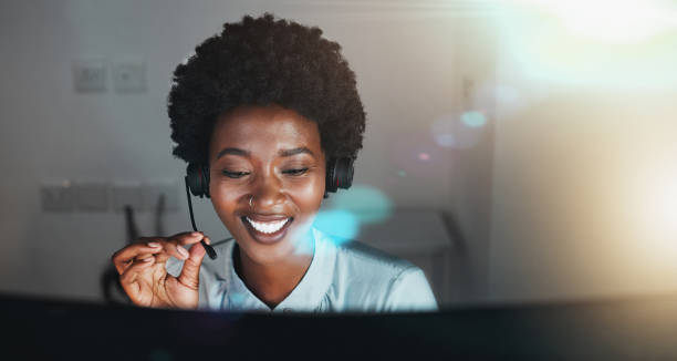 istock Call center, customer service and support with a business black woman using a headset for telemarketing or sales. Contact, crm and retail with a female consultant or employee working in her office 1477113391