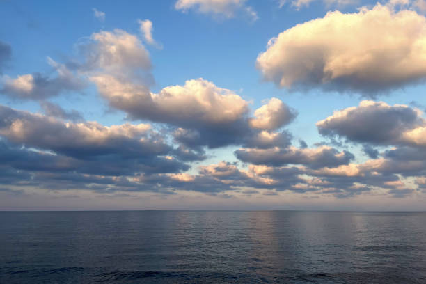 istock Beautiful blue sea and sky with clouds. Nature background. 1477116485