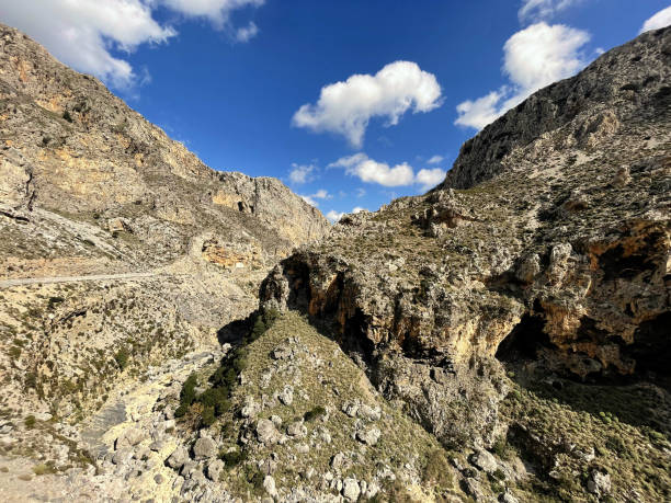 istock A big rocks on background of blue sky. 1477117103