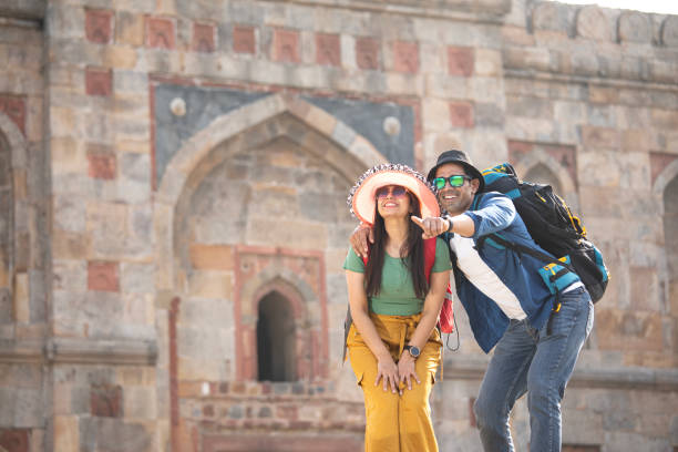 istock Couple having fun admiring view at historic site 1477120115