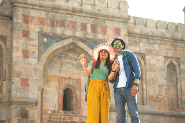 istock Couple having fun admiring view at historic site 1477120641