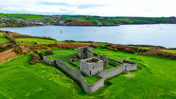 Aerial view of old ruin structure, Kinsale, Ruins of James Fort Ireland, Historical monastery, James Fort, Co. Cork, Ireland, View of green hill,Aerial view of James fort Kinsale Ireland, Charles Fort Kinsale, Stone building left in Ruin vista aérea de la antigua estructura de la ruina, kinsale, ruinas de james fort irlanda, monasterio histórico, james fort, co. cork, irlanda, vista de la colina verde, vista aérea del fuerte de james kinsale irlanda, charles fort kinsale, edificio de pi
