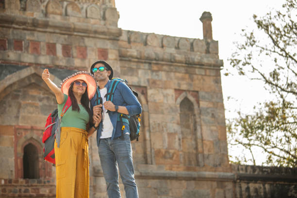 istock Couple having fun admiring view at historic site 1477121202