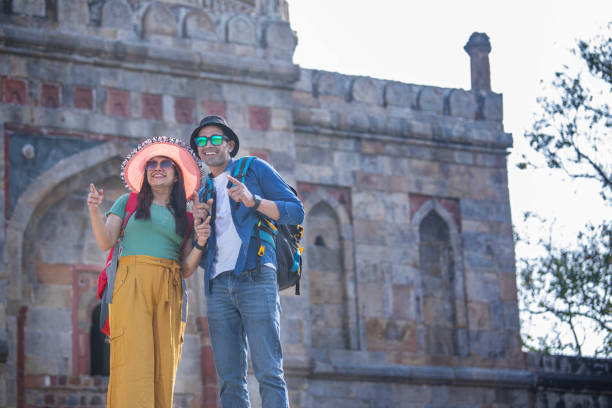 istock Couple having fun admiring view at historic site 1477121260