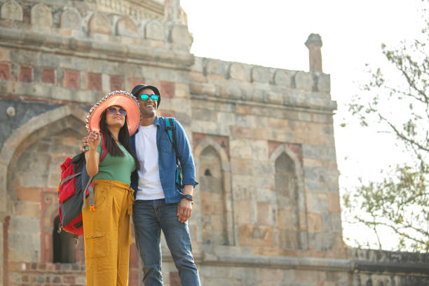 istock Couple having fun admiring view at historic site 1477121814