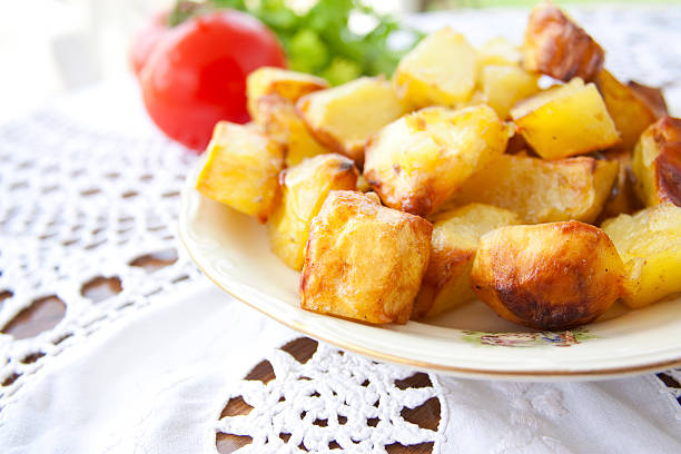 istock Roasted golden potatoes 147712187