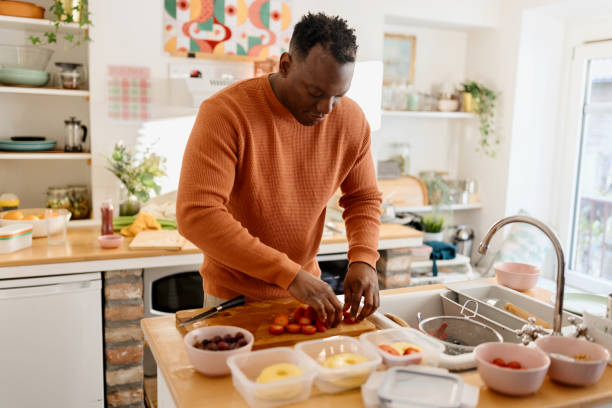 istock Man preparing healthy balanced vegetarian food 1477121879
