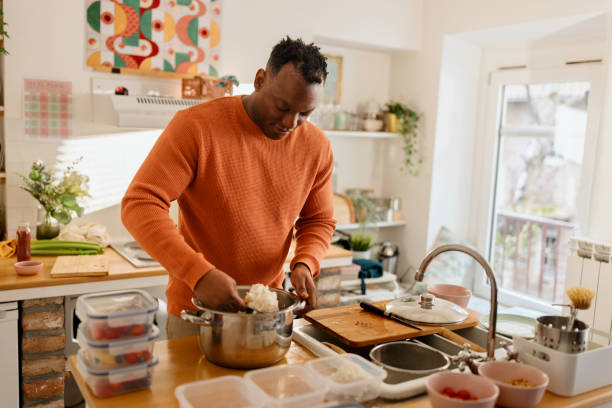 istock Man preparing healthy balanced vegetarian food 1477122454