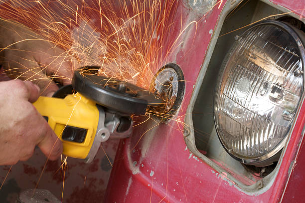 istock Car Mechanic Using A Grinder In His garage 147712313