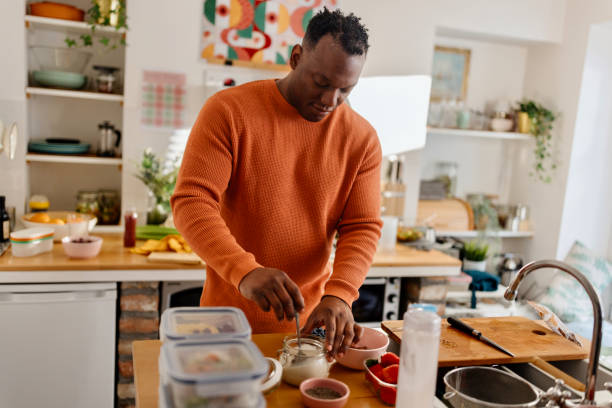 istock Man preparing healthy balanced vegetarian food 1477123545