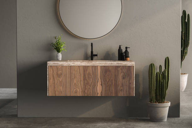 istock 3D render close up blank empty space on vanity unit counter top with wash basin, modern black faucet in an exotic style bathroom. Tropical decor plants. 1477131044