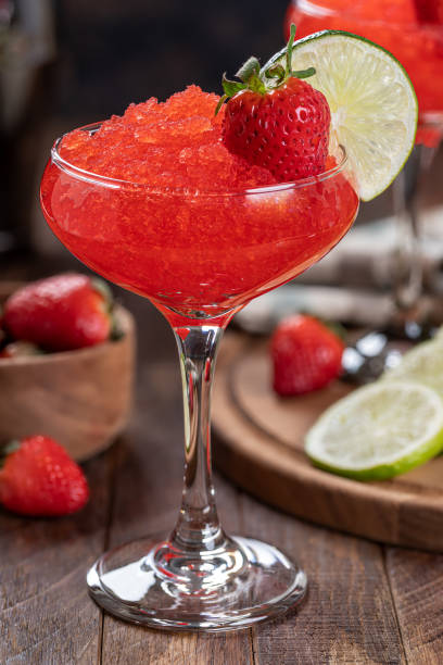 istock Frozen strawberry daiquiri cocktail with strawberries and lime 1477134354