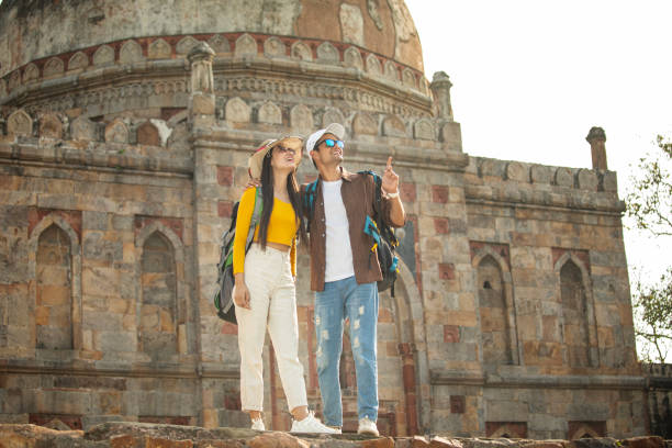 istock Couple having fun admiring view at historic site 1477134364