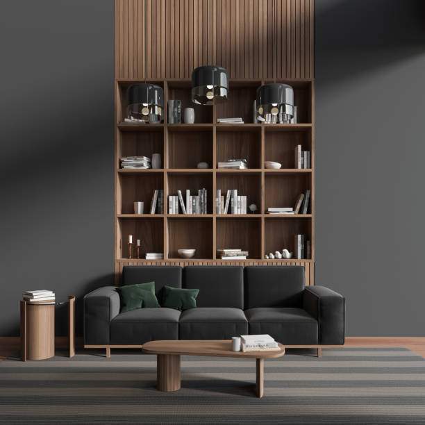 istock Dark relaxing interior with couch and wooden shelf, panoramic window 1477134990