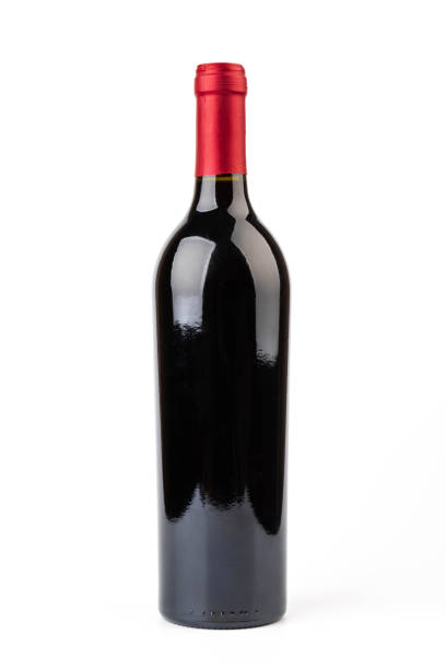 istock Bottle of red wine with red foil on a white background. 1477135944