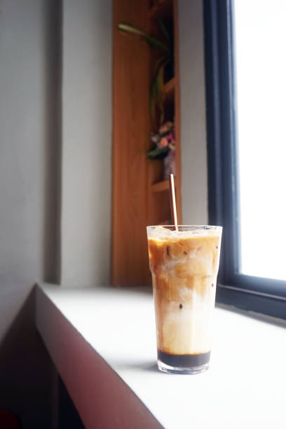 istock iced coffee in a glass on a wooden table 1477136259