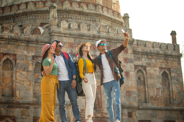 istock Group of friends taking selfie at historic site 1477136632