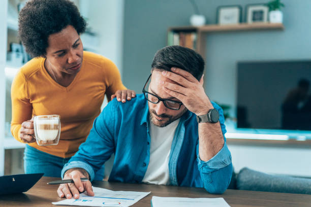 istock Couple doing their budget at home 1477137196