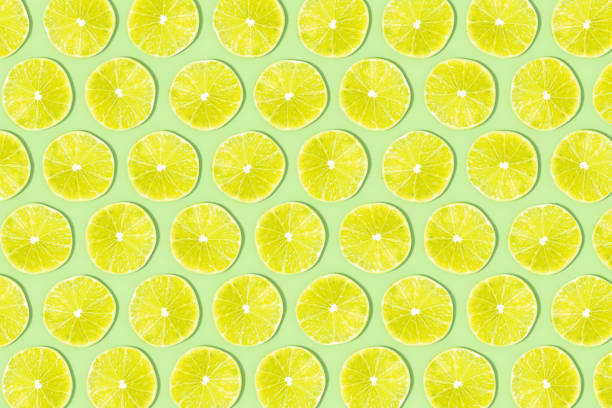 Green Lime Slices with Sunlight on Green Background, 3d render.
