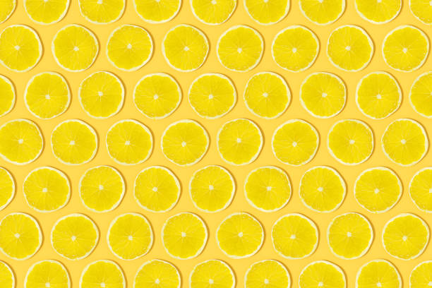 Yellow Lime Slices with Sunlight on Yellow Background, 3d render.