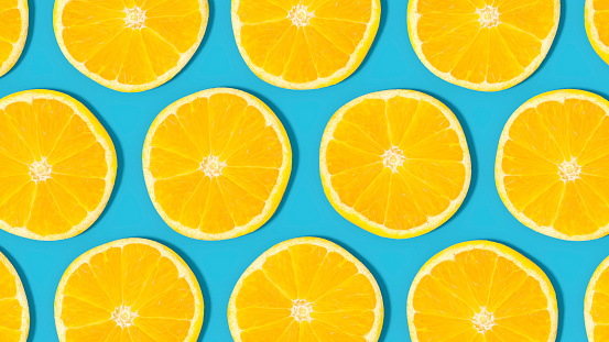 Orange Slices with Sunlight on Blue Background, 3d render.