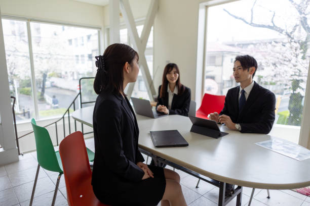 istock Business people having meeting in bright office 1477152529
