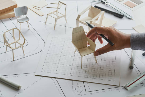 istock Designer sketching drawing design development product plan draft chair armchair Wingback Interior furniture prototype manufacturing production. designer studio concept . 1477152654