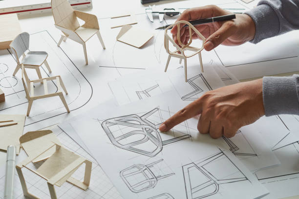 istock Designer sketching drawing design development product plan draft chair armchair Wingback Interior furniture prototype manufacturing production. designer studio concept . 1477152656