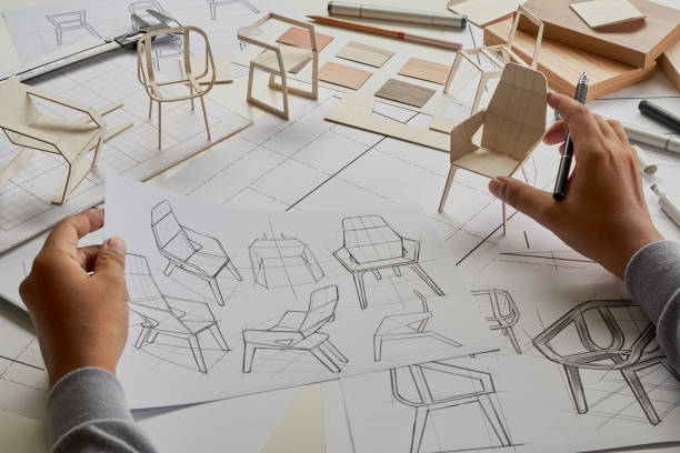 istock Designer sketching drawing design development product plan draft chair armchair Wingback Interior furniture prototype manufacturing production. designer studio concept . 1477152661