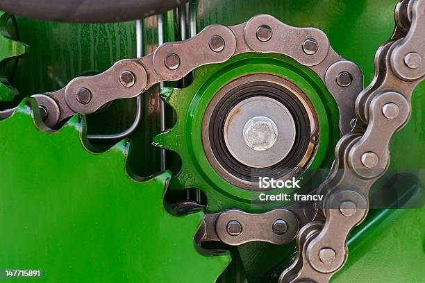 Strong Chain On The Machine In Green Stock Photo - Download Image Now - Chain - Object, Agricultural Equipment, Agricultural Machinery