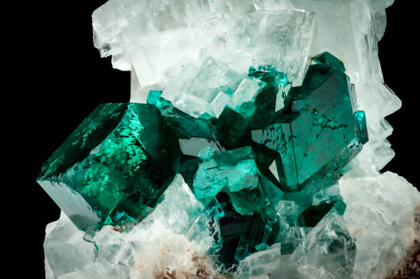 istock Dioptase crystal on white calcite 1477160859