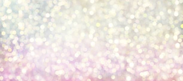 istock Abstract blurred delicate, pearlescent, pink and yellow color gradient with bokeh background. 1477164079