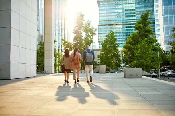 Colleagues leaving work at end of day