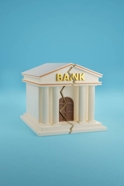 istock Bank building breaking down on blue background. 3d illustration. 1477170800
