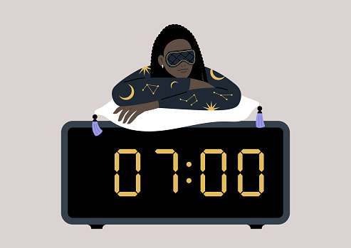 A young female African character dressed in pajamas and a mask, reclines atop a big digital alarm clock