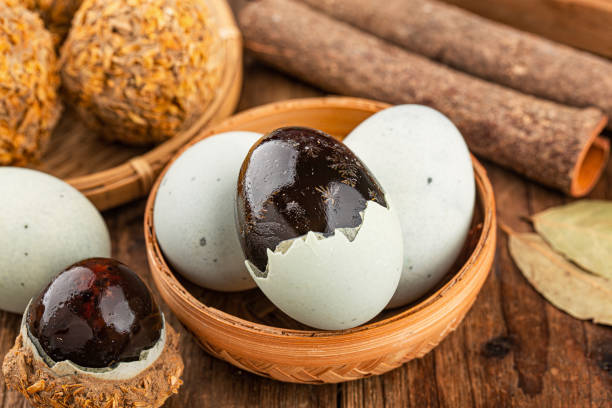 istock preserved duck eggs or Century egg on wood background 1477179306