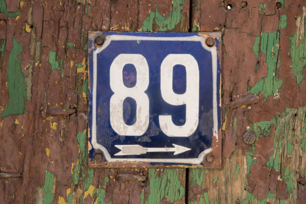 istock Weathered enameled plate number 89 1477179889
