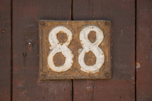 Old retro cast iron plate number 88