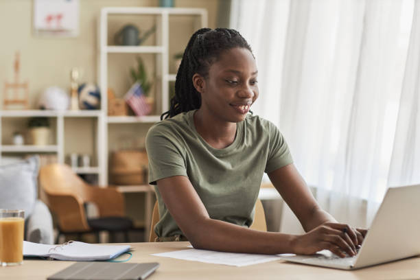 istock Woman doing online work on laptop 1477181001