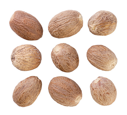 Set of nutmeg from different sides close-up on a white background. Isolated