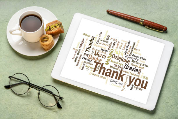 istock thank you in different languages - word cloud on a digital tablet 1477181641