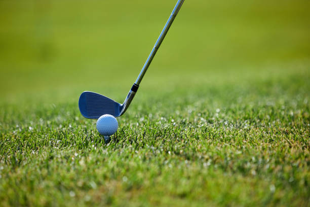 istock Golf club hitting ball 1477183420