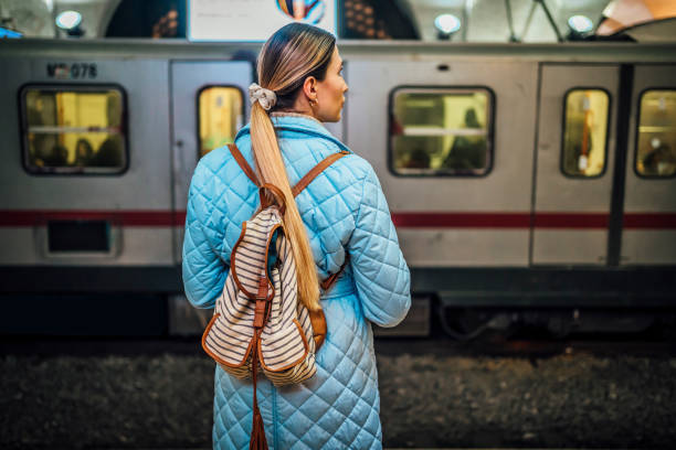 istock Young woman waiting for the subway 1477184991