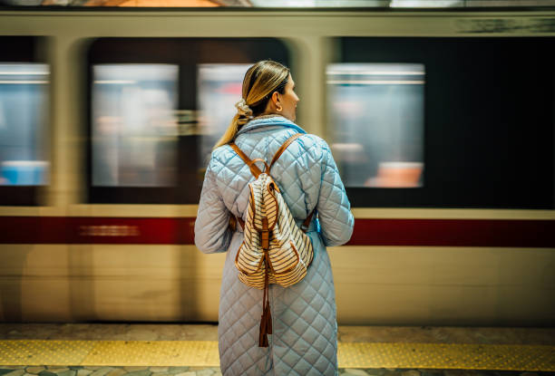 istock Young woman waiting for the subway 1477185378